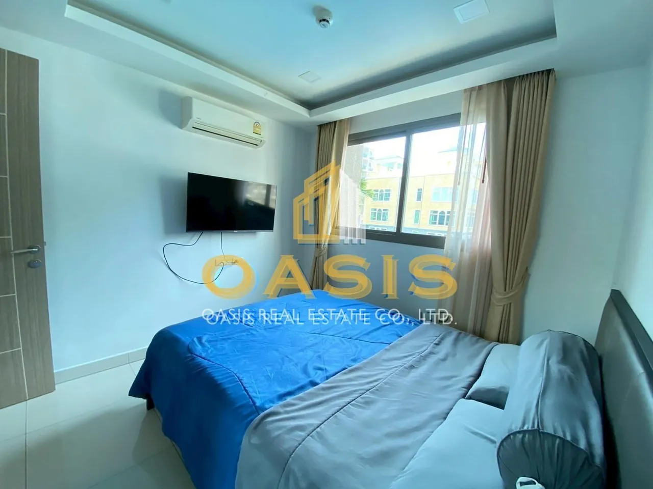 This modern 2-bedroom unit with a relaxing pool view for sale