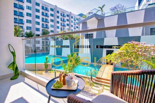 Arcadia Beach Resort – A resort-style condominium  with a stunning pool view