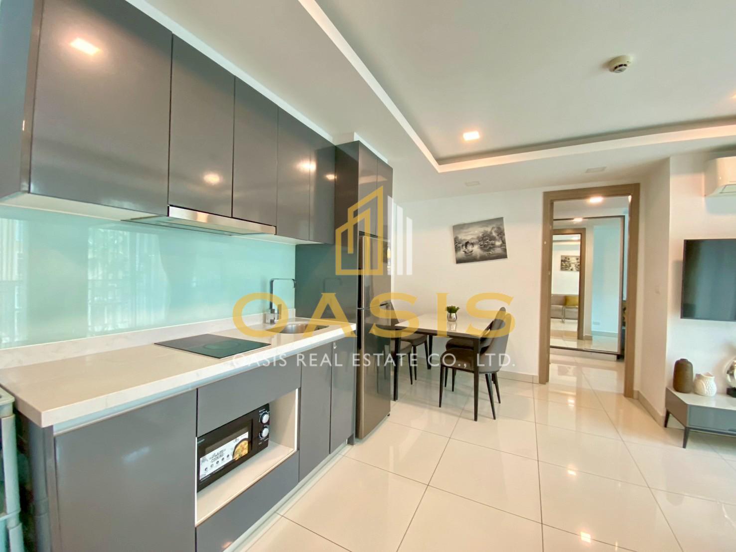 This modern 2-bedroom unit  with a relaxing pool view for sale