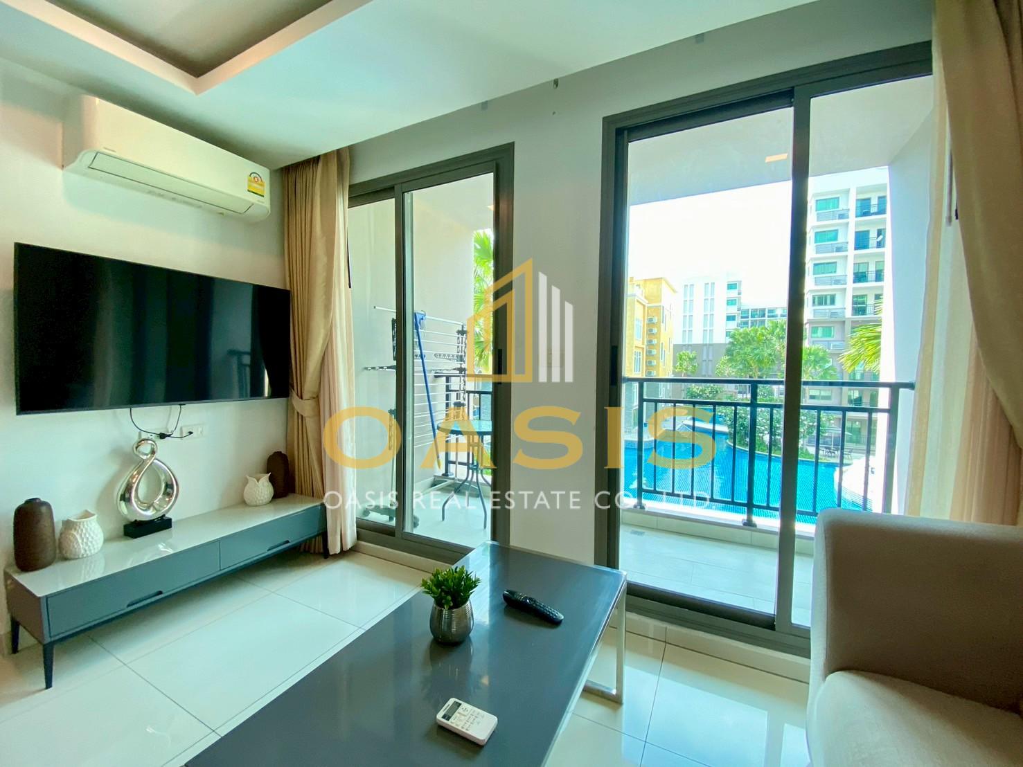 This modern 2-bedroom unit  with a relaxing pool view for sale