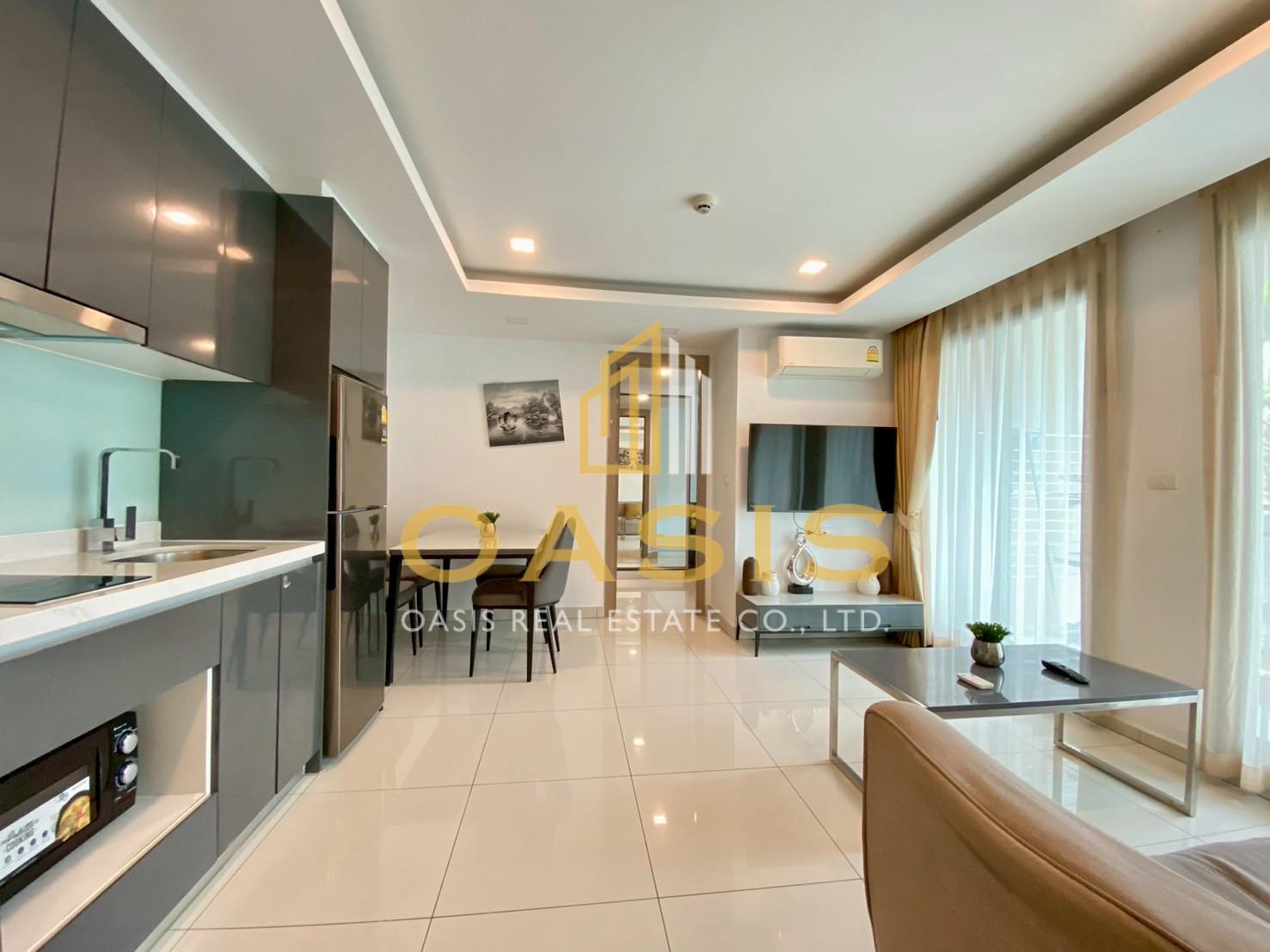 This modern 2-bedroom unit  with a relaxing pool view for sale