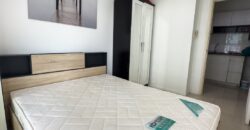 Full view of the pool and the sea from the balcony at Lumpini Park Beach Jomtien