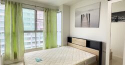 Full view of the pool and the sea from the balcony at Lumpini Park Beach Jomtien