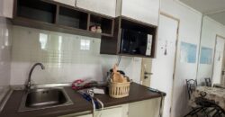 Full view of the pool and the sea from the balcony at Lumpini Park Beach Jomtien