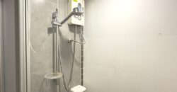 Full view of the pool and the sea from the balcony at Lumpini Park Beach Jomtien