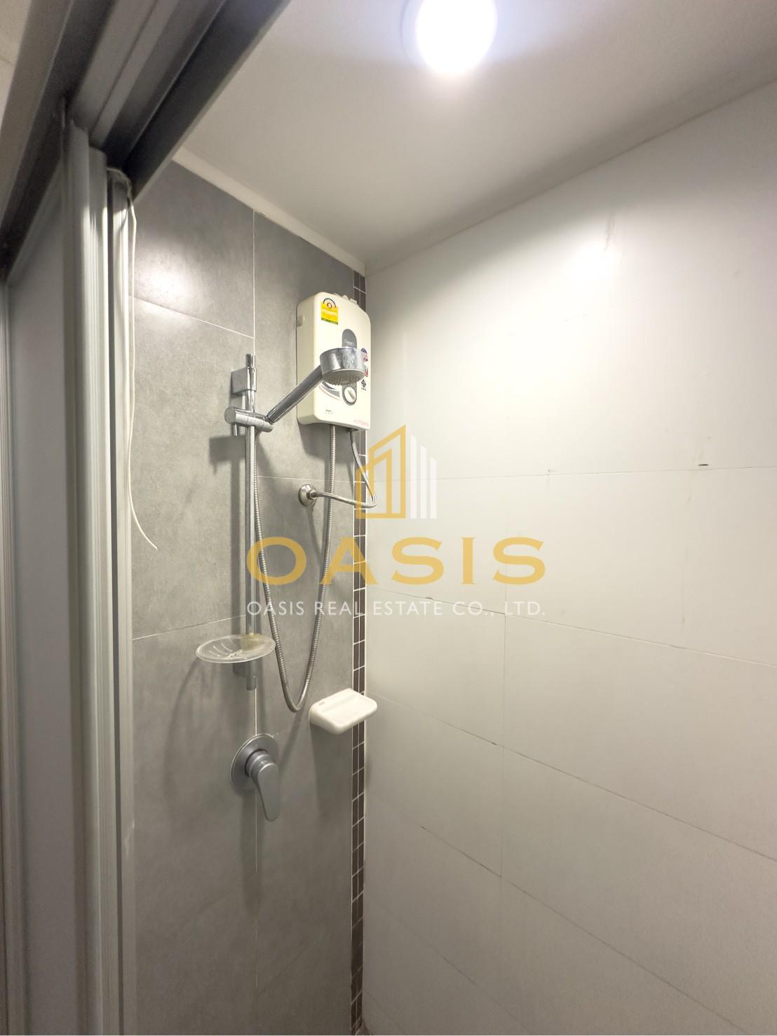 Full view of the pool and the sea from the balcony at Lumpini Park Beach Jomtien