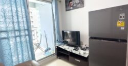 Full view of the pool and the sea from the balcony at Lumpini Park Beach Jomtien